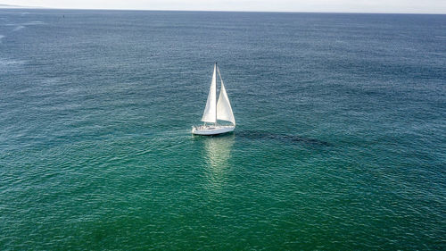 High angle view of sailboat sailing on sea