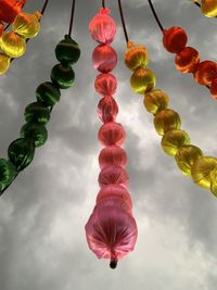 Low angle view of decoration hanging against sky