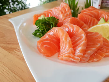 Close-up of fish served in plate on table