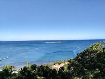 Scenic view of sea against clear sky