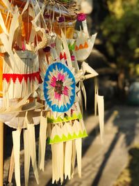 Close-up of multi colored decoration hanging outdoors