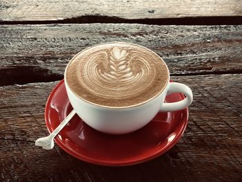 Close-up of coffee cup on table