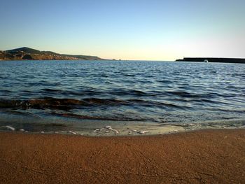 Scenic view of sea against clear sky