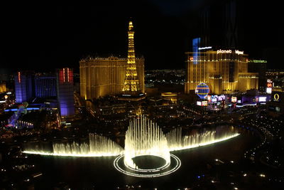 Illuminated cityscape at night