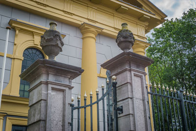 Low angle view of statue against building