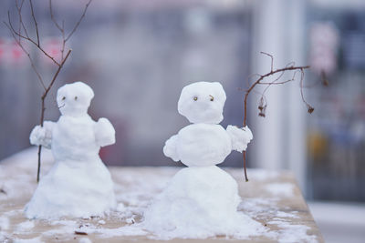 Close-up of snowman on table