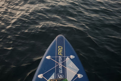 High angle view of text on sea against blue sky