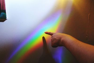 Close-up of rainbow over blurred background