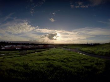 Scenic view of field against sky at night