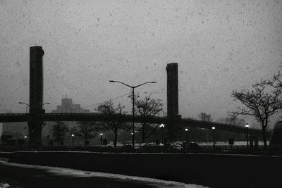 City street against sky during winter