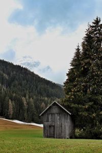 House on field against sky