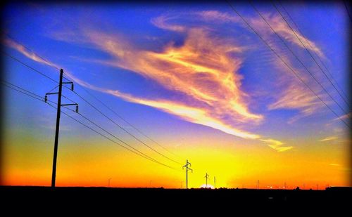 Scenic view of landscape against sky at sunset