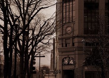 Low angle view of clock tower against sky