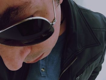 Close-up portrait of man wearing sunglasses