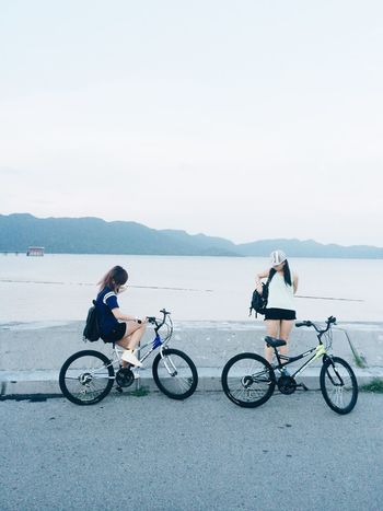 PERSON RIDING BICYCLE ON BICYCLE