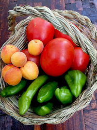 High angle view of vegetables in basket on table