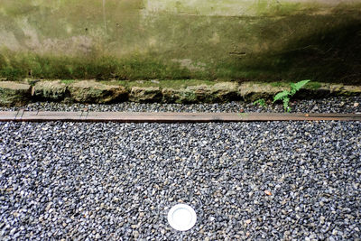 High angle view of railroad tracks by street