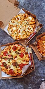 High angle view of pizza on table