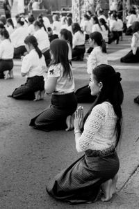 People sitting in town square
