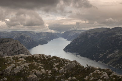 Amazing landscape showing lysefjord and some mountains around under a cloudy sky 