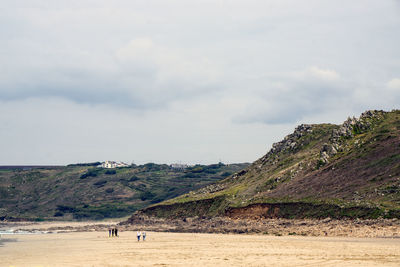 Scenic view of land against sky