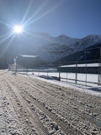 Scenic view of snow covered mountains against sky