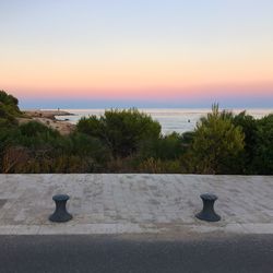 Scenic view of sea at sunset
