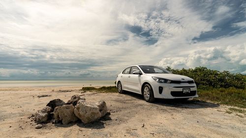 View of car on land against sky