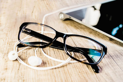 Close-up of sunglasses on table