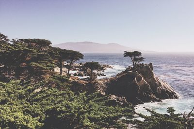 Scenic view of sea with mountains in background