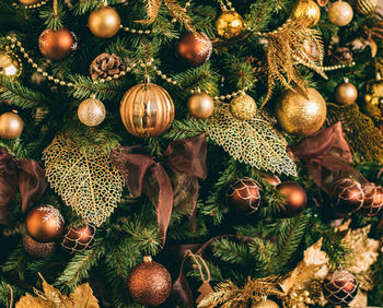 Close-up of christmas decoration hanging on tree