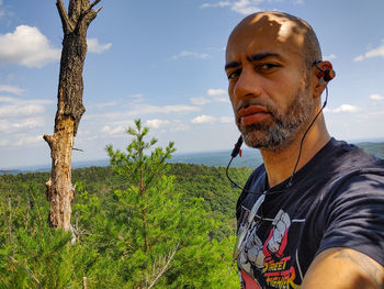 Portrait of man against sky