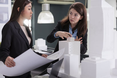 Business colleagues working in office