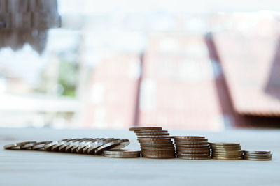 Close-up of coins on table