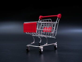 Close-up of red wicker basket on display at store