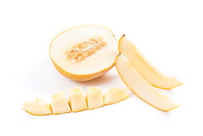 Close-up of chopped fruit against white background