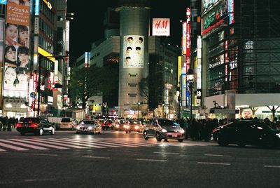 Traffic on city street at night