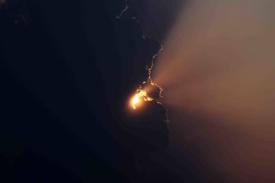 Low angle view of silhouette landscape against sky during sunset