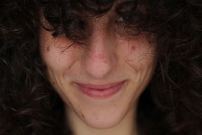 Close-up portrait of smiling woman