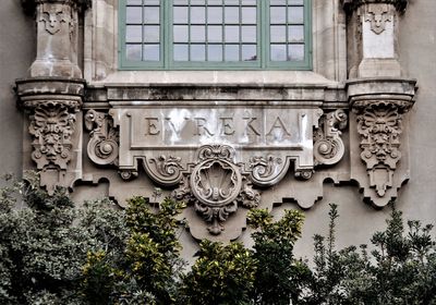 Low angle view of sculpture on building