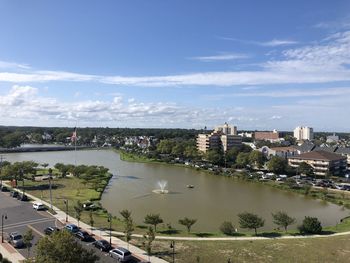 High angle view of bridge over river amidst buildings in city