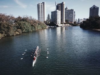 High angle view of people canoeing on river