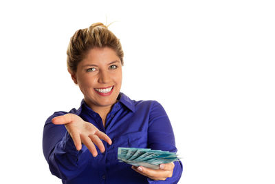 Portrait of a smiling young woman over white background