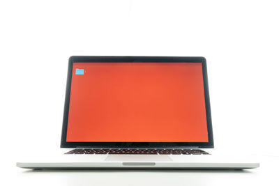 Close-up of laptop on white background