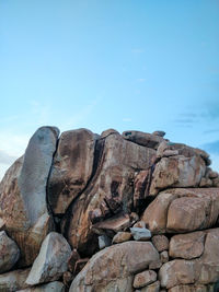 Rock formation against clear blue sky