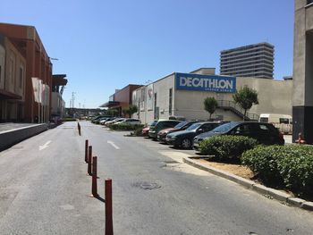 View of road along buildings