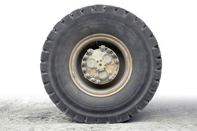 Close-up of wheel against white background