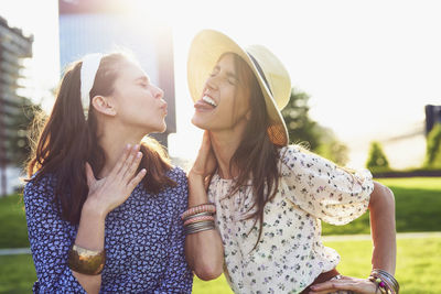 Young woman smiling outdoors