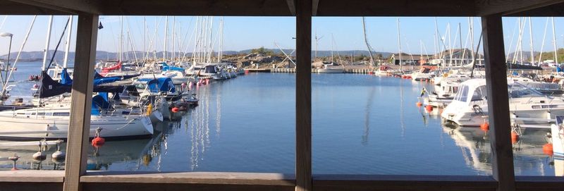 Boats moored in harbor