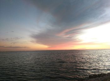 Scenic view of sea at sunset